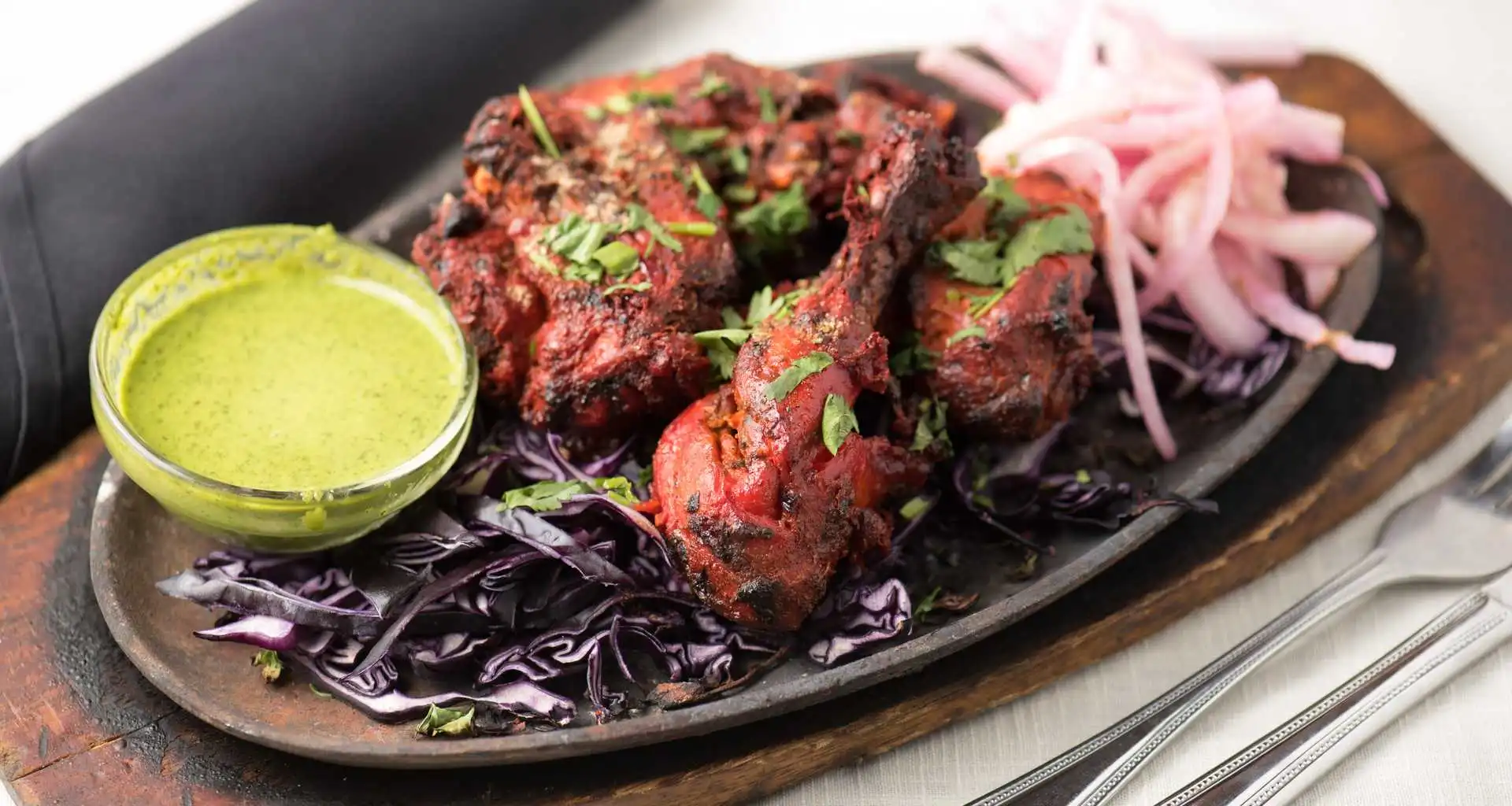 Tandoori Chicken - Authentic tandoor-cooked dish at Daawat Authentic Multi Kitchen & Bar Edmonton